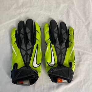Nike football receiver gloves
Lime green and black 
Medium adult